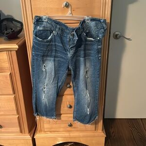 Ariya size 21 3/4 jeans with tears